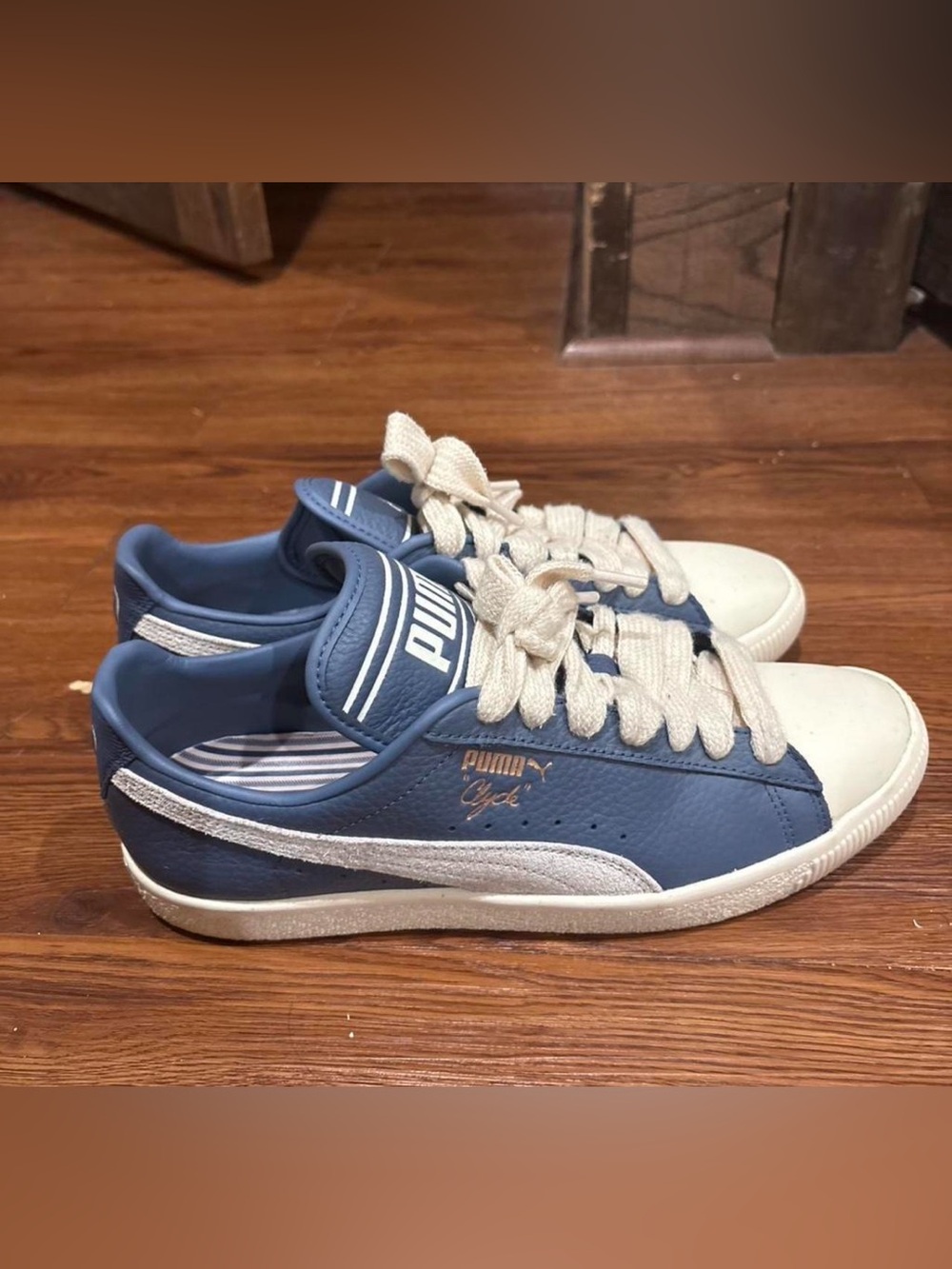 Puma Clyde Low Sneakers in Dusty Blue and White with Gold Logo